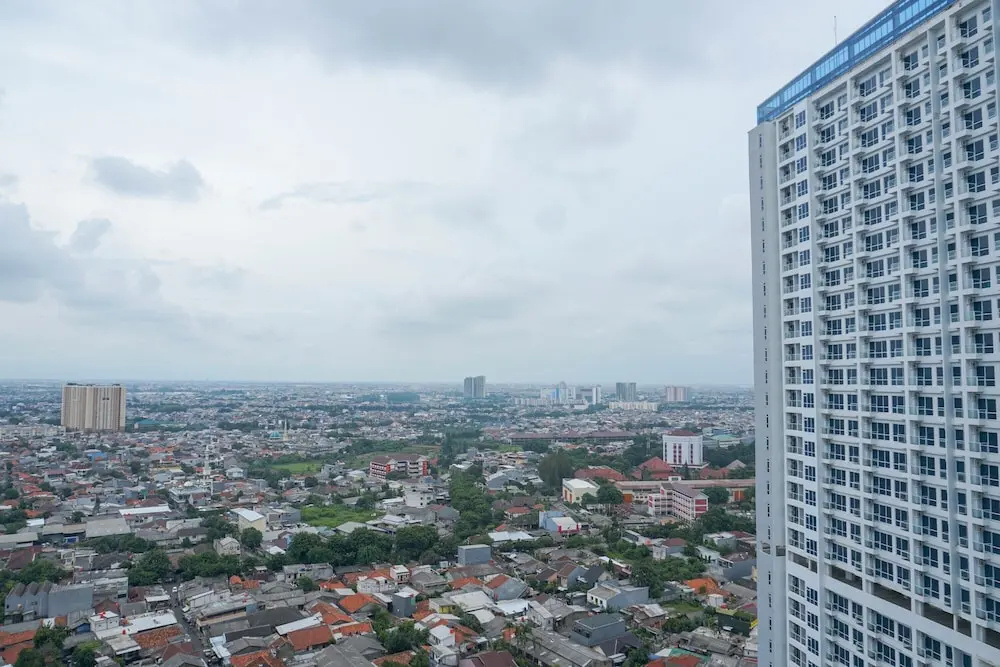 Modern with City View @ Studio Puri Mansion Apartment By Travelio