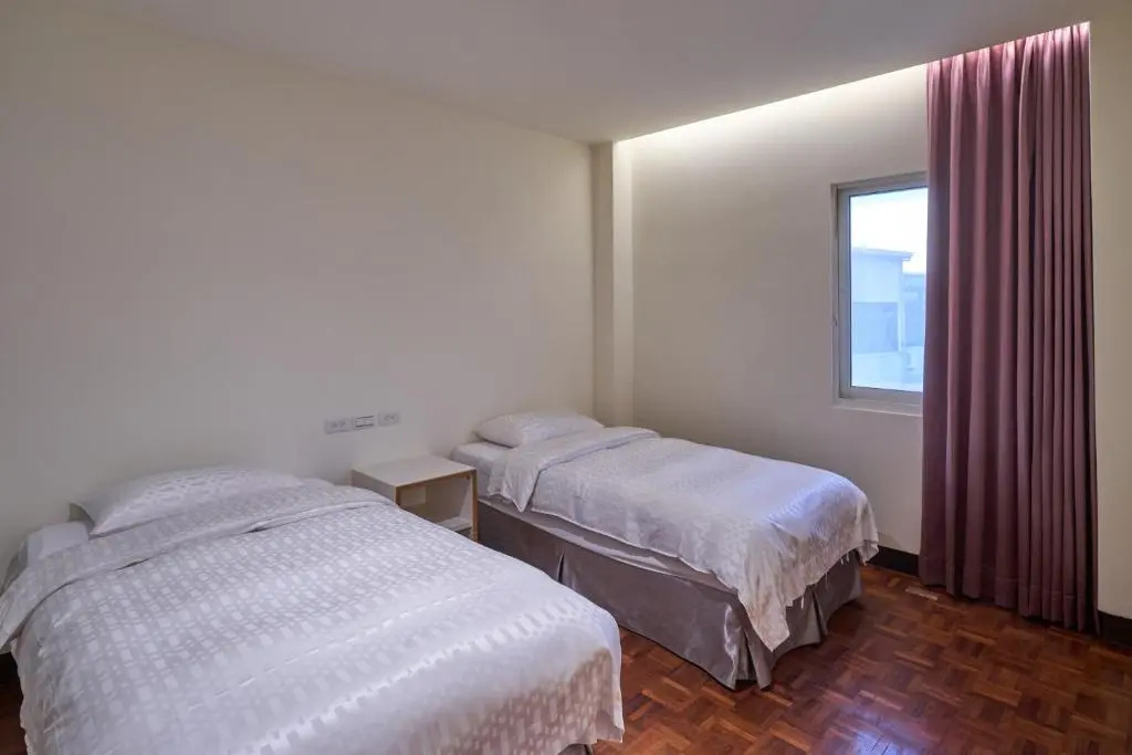 Yung An Business Hotel - Chambres