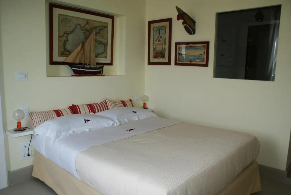 Yacht Club Capo Cervo Suites - Chambres