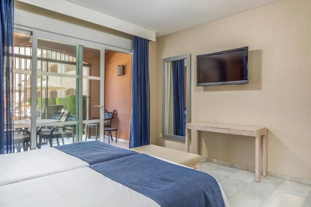 Los Amigos Beach Club Hotel - Chambres