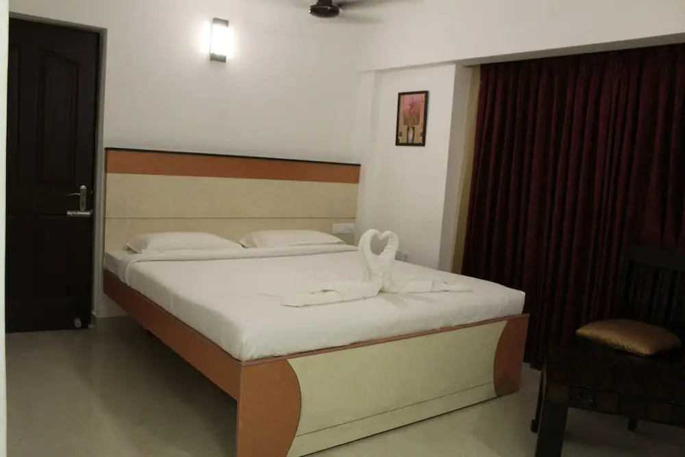 Hotel Karpagam International - Chambres
