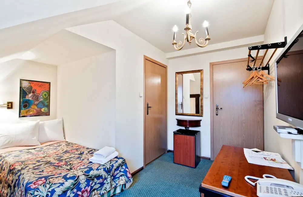 Aparthotel Miodosytnia - Chambres