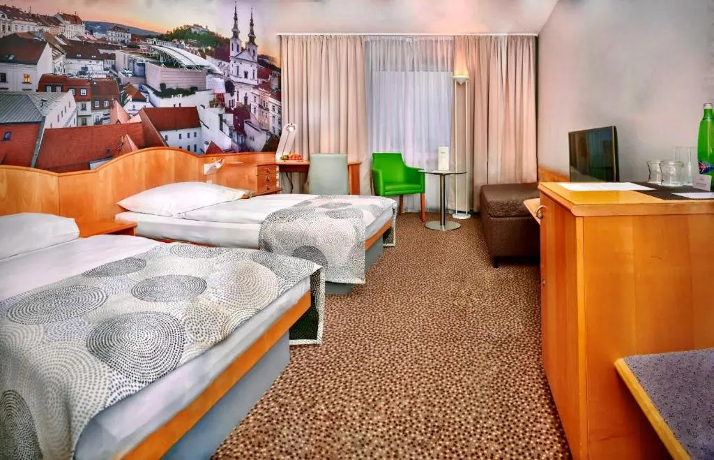 Cosmopolitan Bobycentrum - Chambres