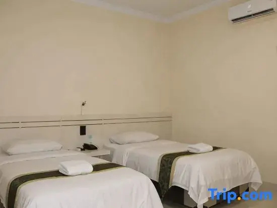 Griya Hotel - Chambres