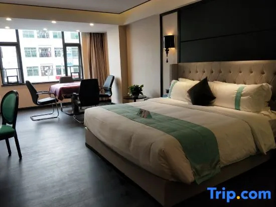 Xinliyuan Hotel - Chambres