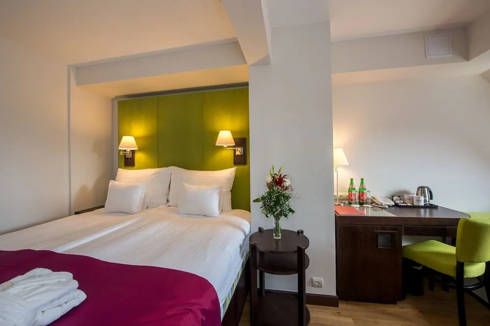 Three Corners Hotel Art - Chambres