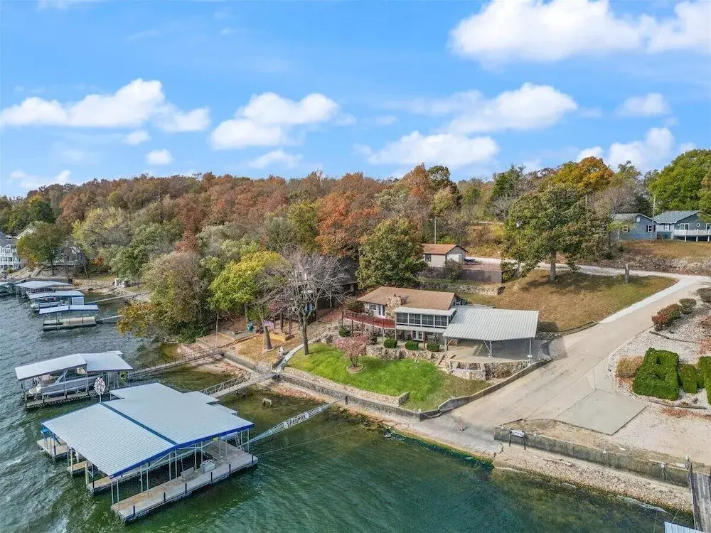 Newly Updated Interior, Sunroom w/ Hot Tub, Deck, Deep Water Dock, Boat & PWC Slips