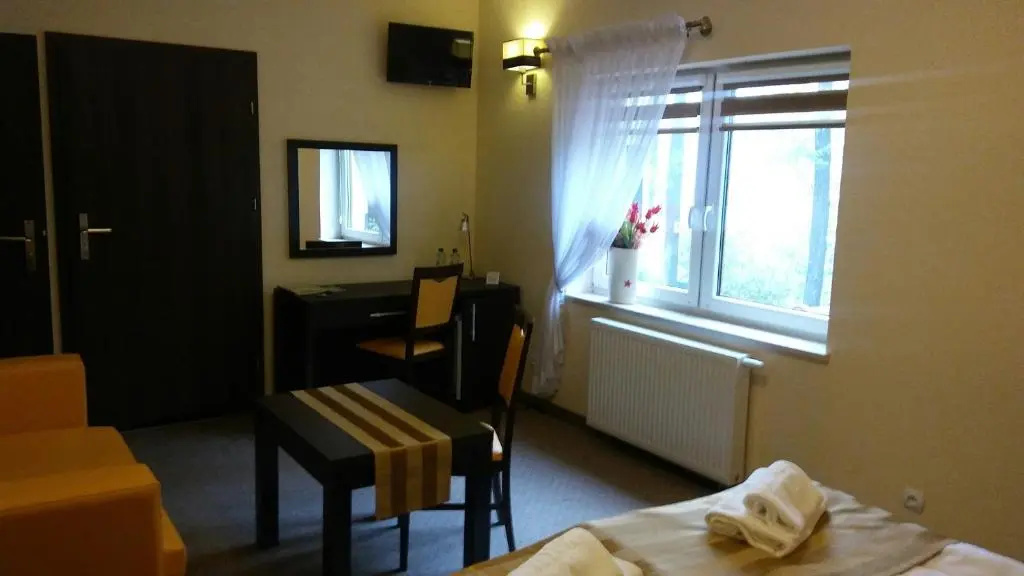 Hotel Pod Dębami - Chambres