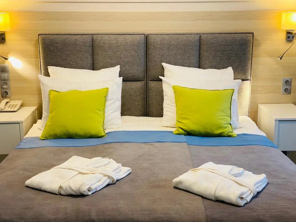 Amrita Hotel - Chambres