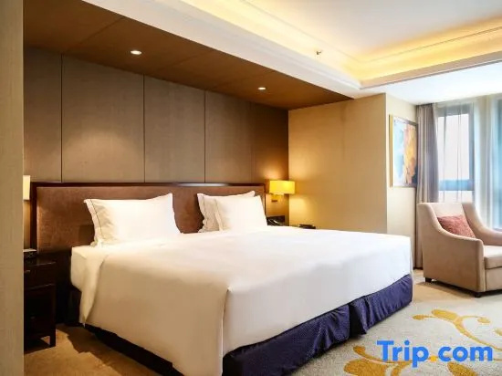 Sky World Hotel Qingdao - Chambres