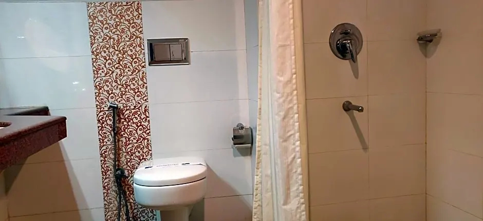 Hotel Saptagiri - Chambres