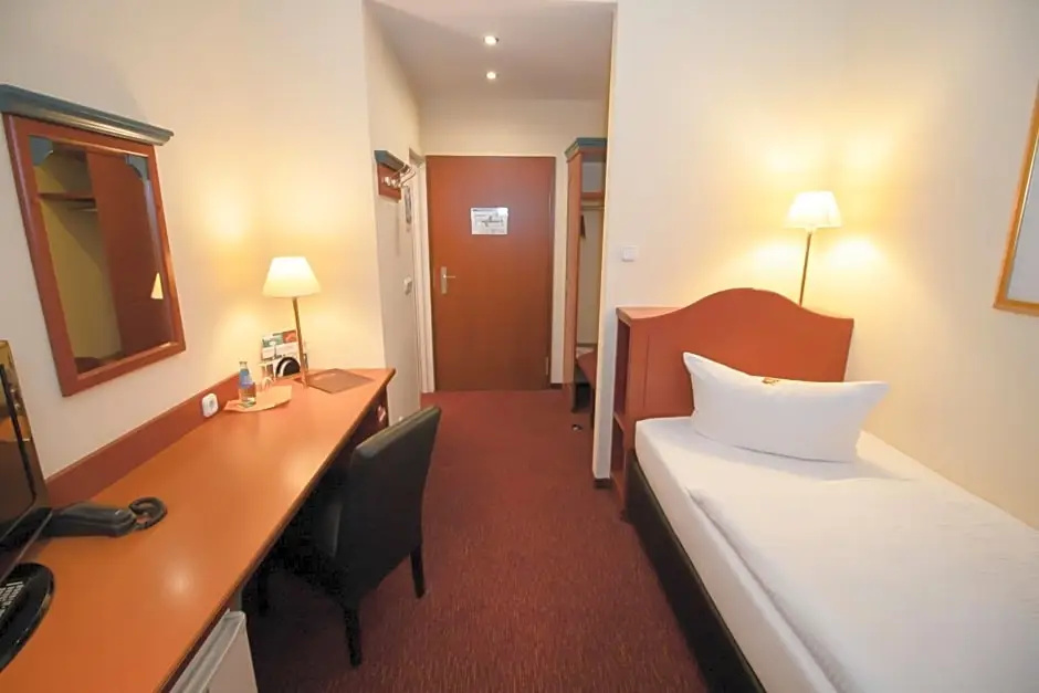 AKZENT Hotel Am Goldenen Strauss - Chambres