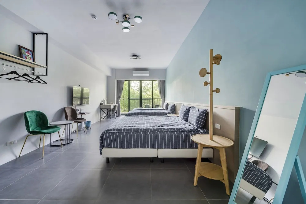 Standard Quadruple room with balcony and with garden view