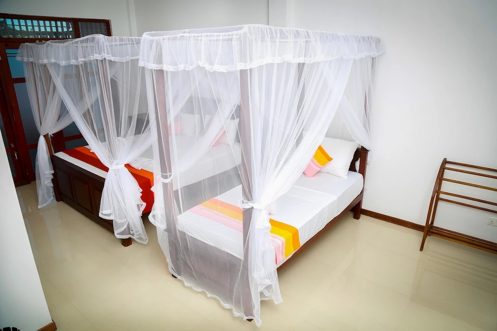 Deluxe Triple room beachfront