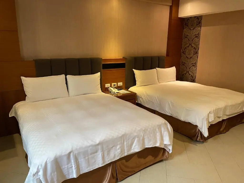 Chia Shih Pao Hotel - Chambres