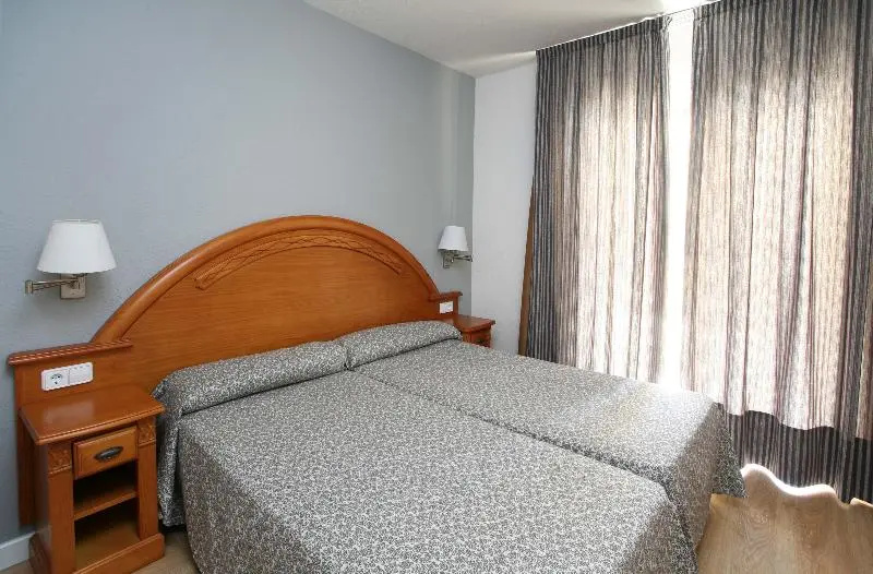 Apartamentos Turísticos Jardines del Plaza - Chambres