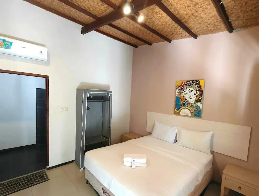 Si Pitung Village - Chambres