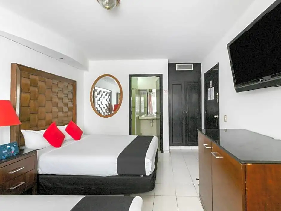 Capital O Zona Dorada Inn - Chambres