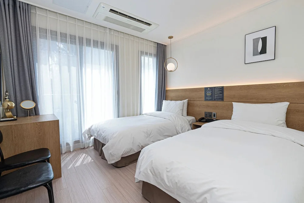Hotel The Grang Jungmun - Chambres
