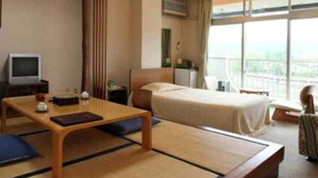 Kameyama Onsen Hotel - Chambres