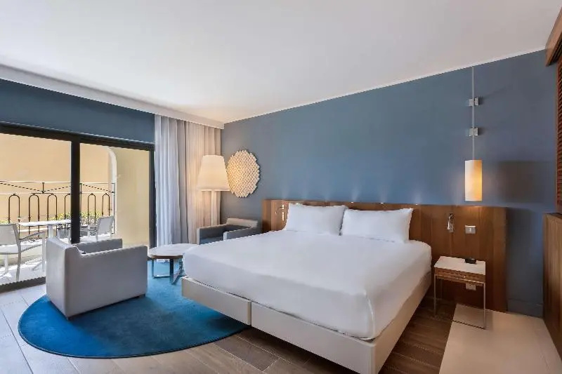 Deluxe Double room with balcony and with garden view (full double bed)