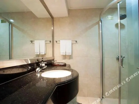 Tian Bao International Hotel - Chambres