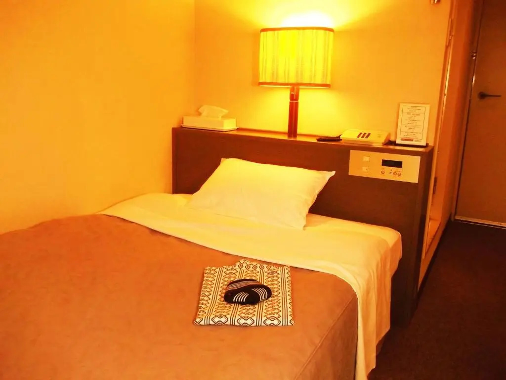 Hotel Heart Inn - Chambres