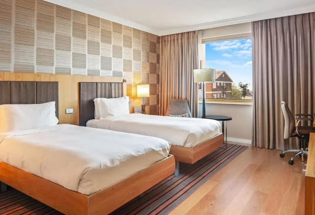 NH Johannesburg Sandton Hotel - Chambres