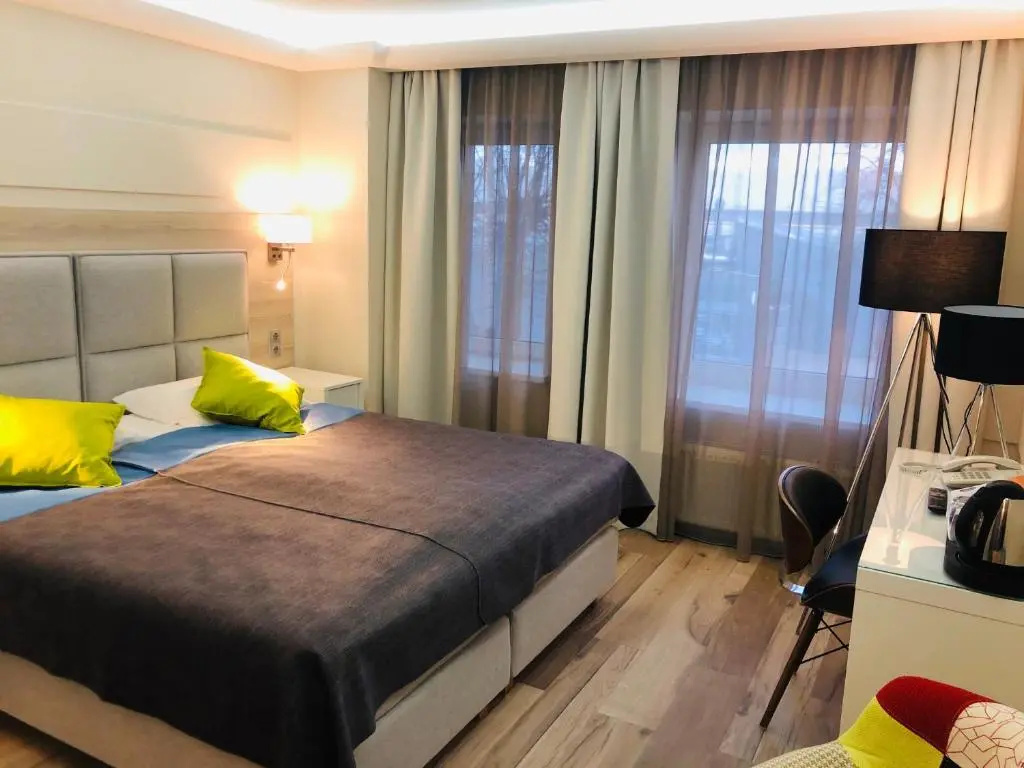 Amrita Hotel - Chambres