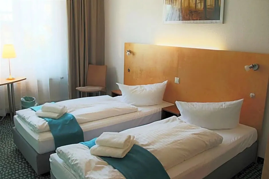 Check Inn Hotel - Chambres