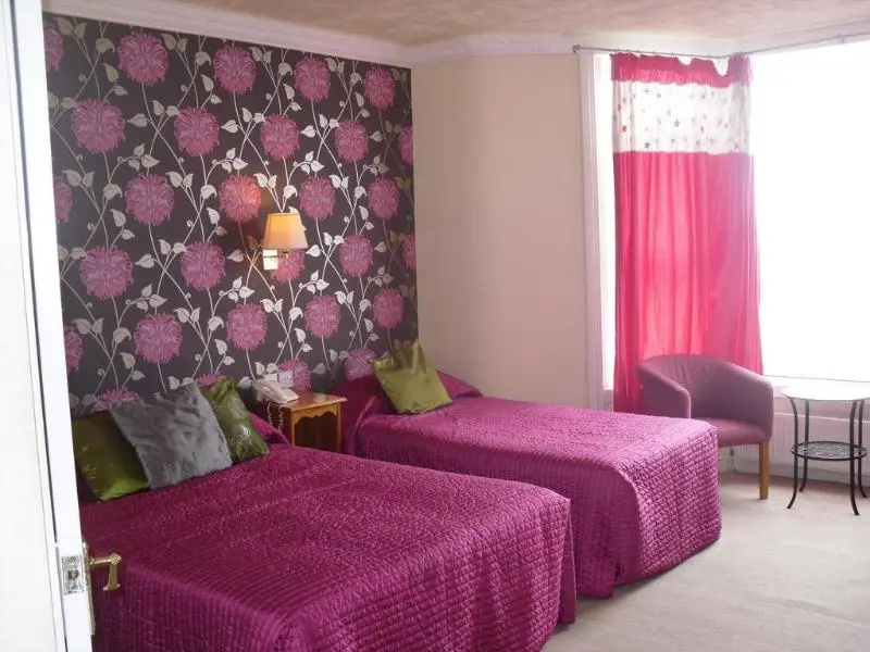 Tiffanys Hotel - Chambres