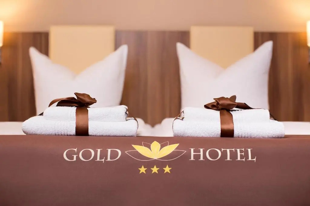 Gold Hotel - Chambres