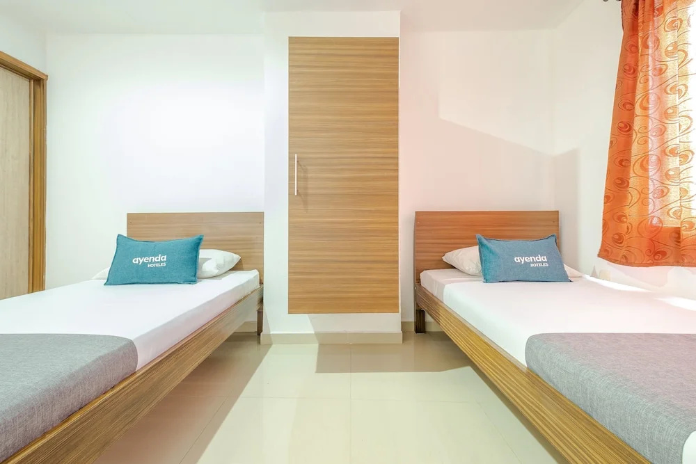 Hotel Metropolitana Plaza - Chambres