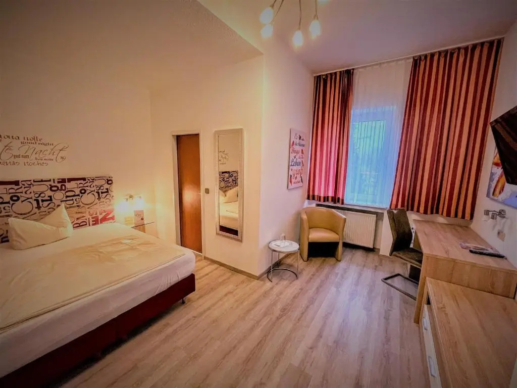 Arena Hotel - Chambres