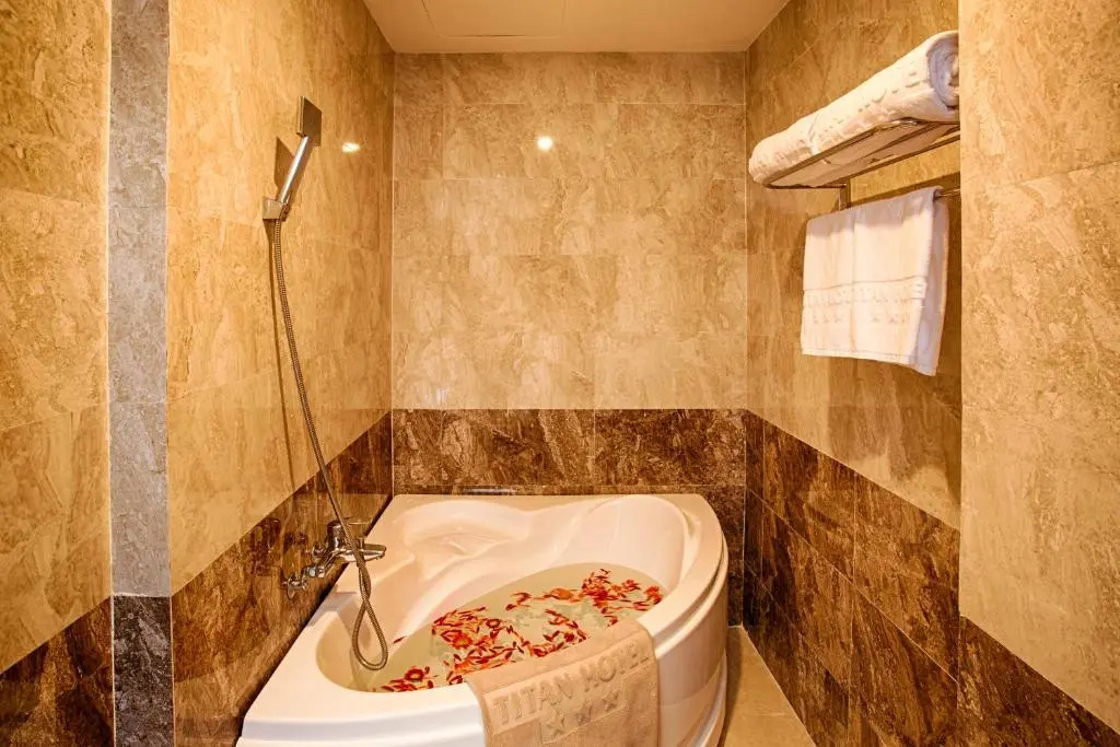Titan Hotel - Chambres