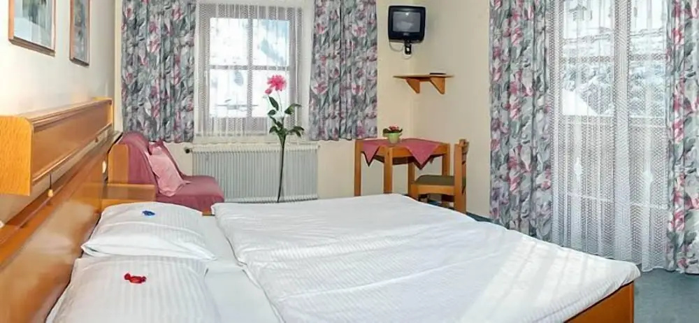 Hotel und Aparthotel Almrösl - Chambres