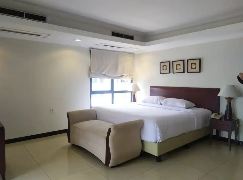 Grand Tropic Suites Hotel - Chambres