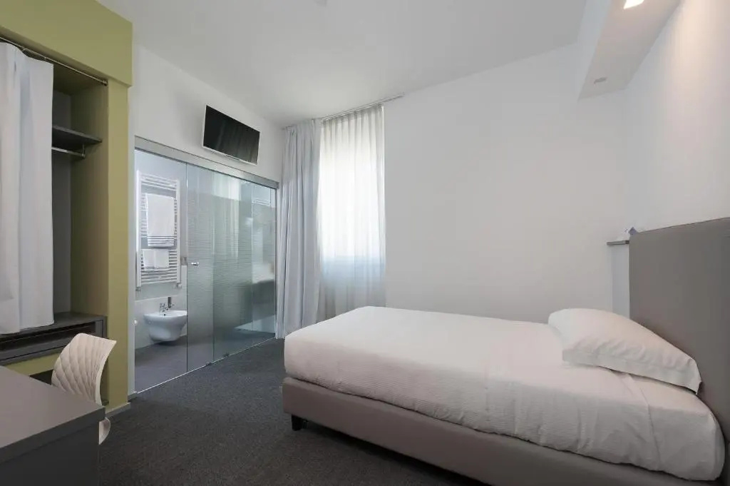 Hotel Executive Inn - Chambres
