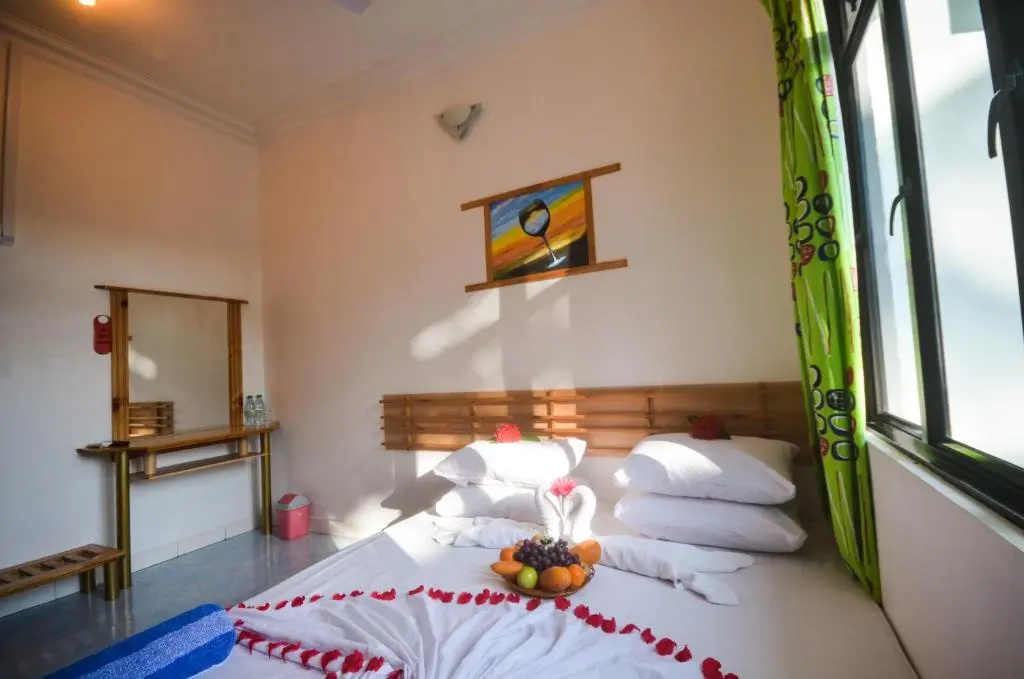 Blue Water Thoddoo Inn - Chambres