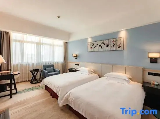Sanyou International Hotel - Chambres
