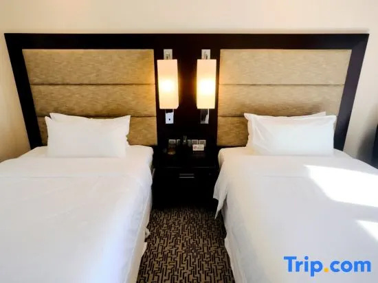 NCEC Jinyuan Hotel - Chambres