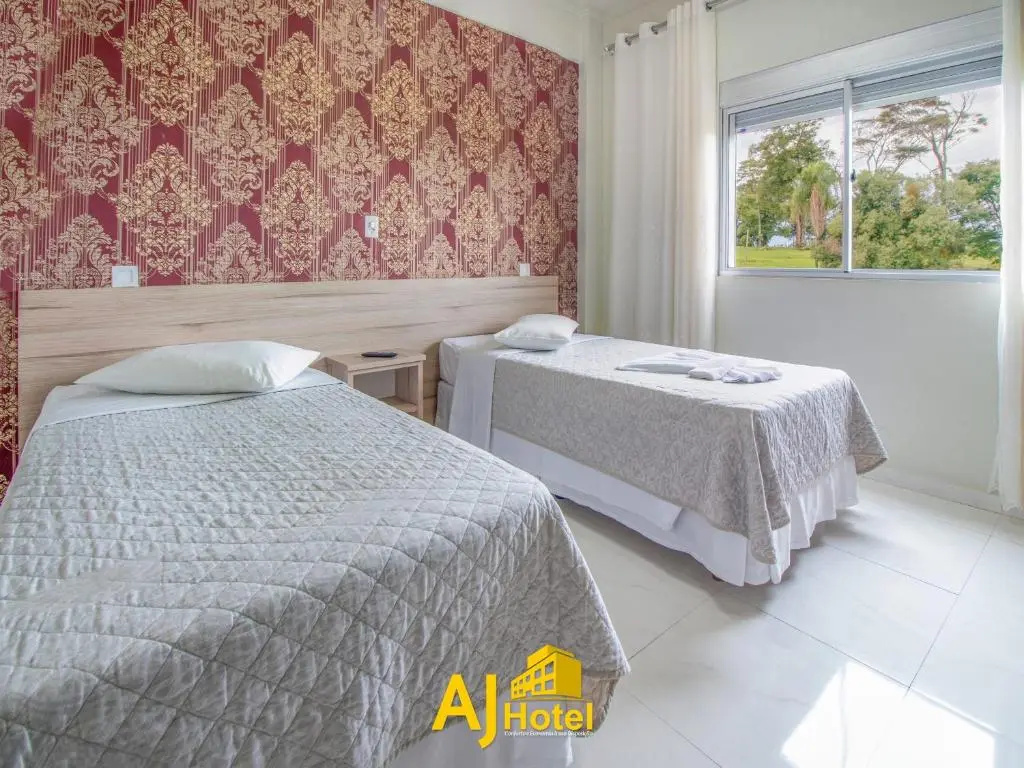 Aj Hotel - Chambres