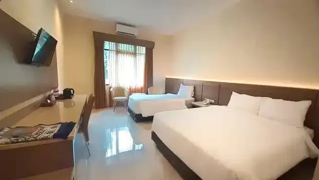 Multazam Syariah Hotel - Chambres