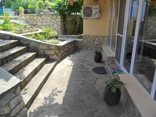 Part of the house in the apple garden