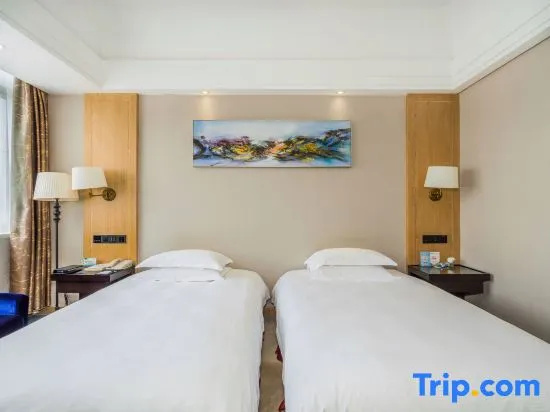 Sanyou International Hotel - Chambres