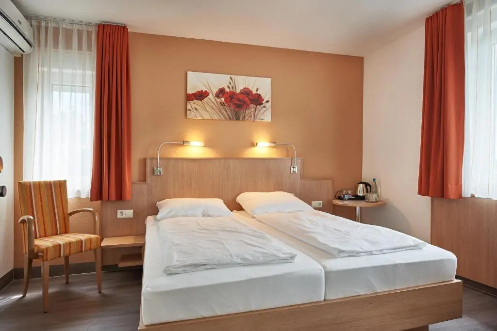 Hotel Touristik - Chambres