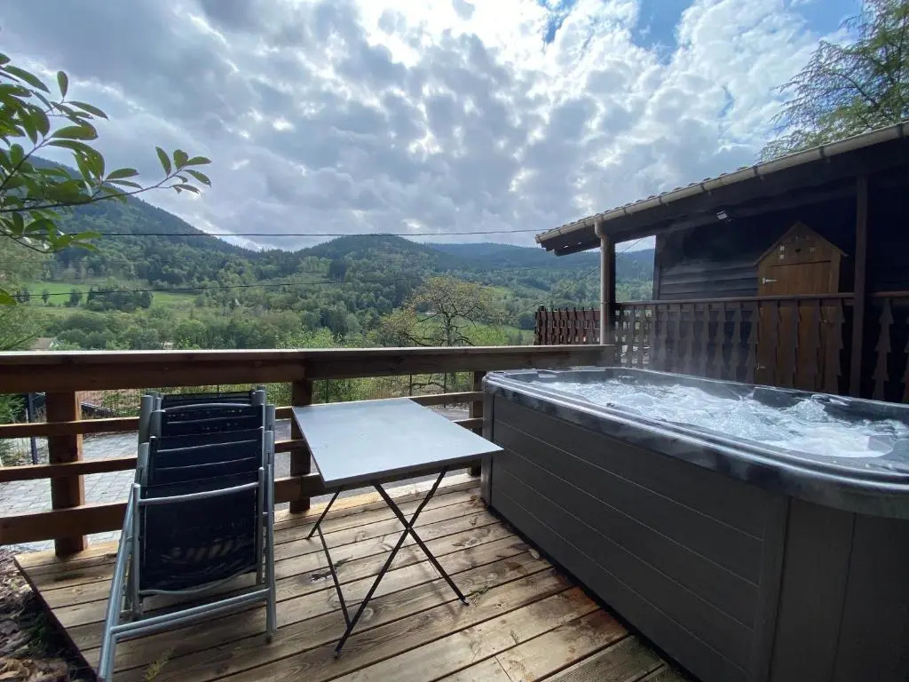 Voir la photo 4 — Chalet du Faubourg & Jacuzzi privatif