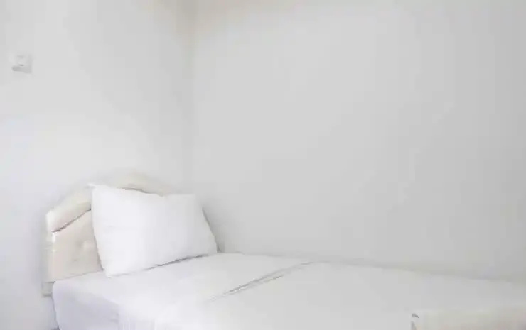 Spacious and Nice 2BR Apartment at Pinewood near JATOS By Travelio