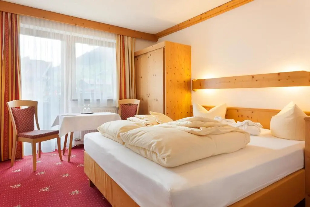 Hotel Pinzger - Chambres
