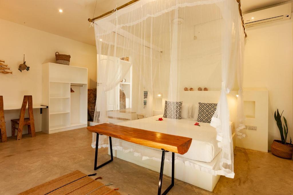 Отель La Pointe Beach Huts, фото 10